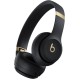 Беспроводные наушники Beats Solo 4 в чёрном золотом исполнении.